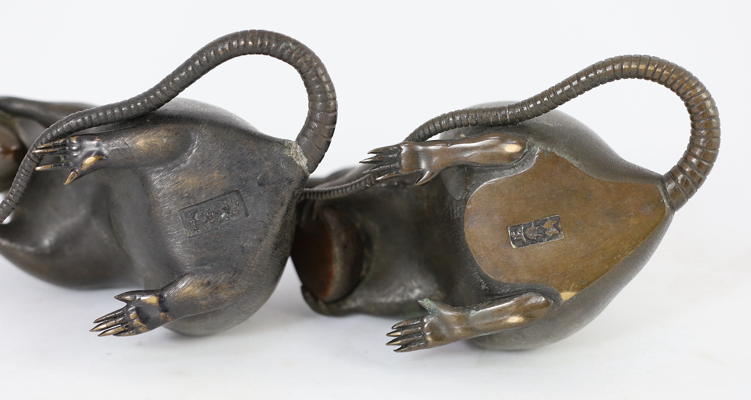 An assembled group of five Japanese bronze and mixed metal models of rats, Meiji period, smallest 9.5cm long, largest 16.5cm long, one small rat tail detached